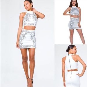 Boutique white studded mini skirt
